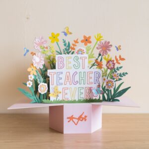 Pastel pink pop-up card with blooming flowers and playful text for a lively Teacher's Day celebration.