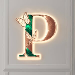 Radiant rose gold and green "P" with soft glow, perfect for a stylish name DP.