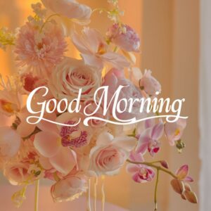 Pastel roses and peonies in soft morning light with a delicate good morning message."